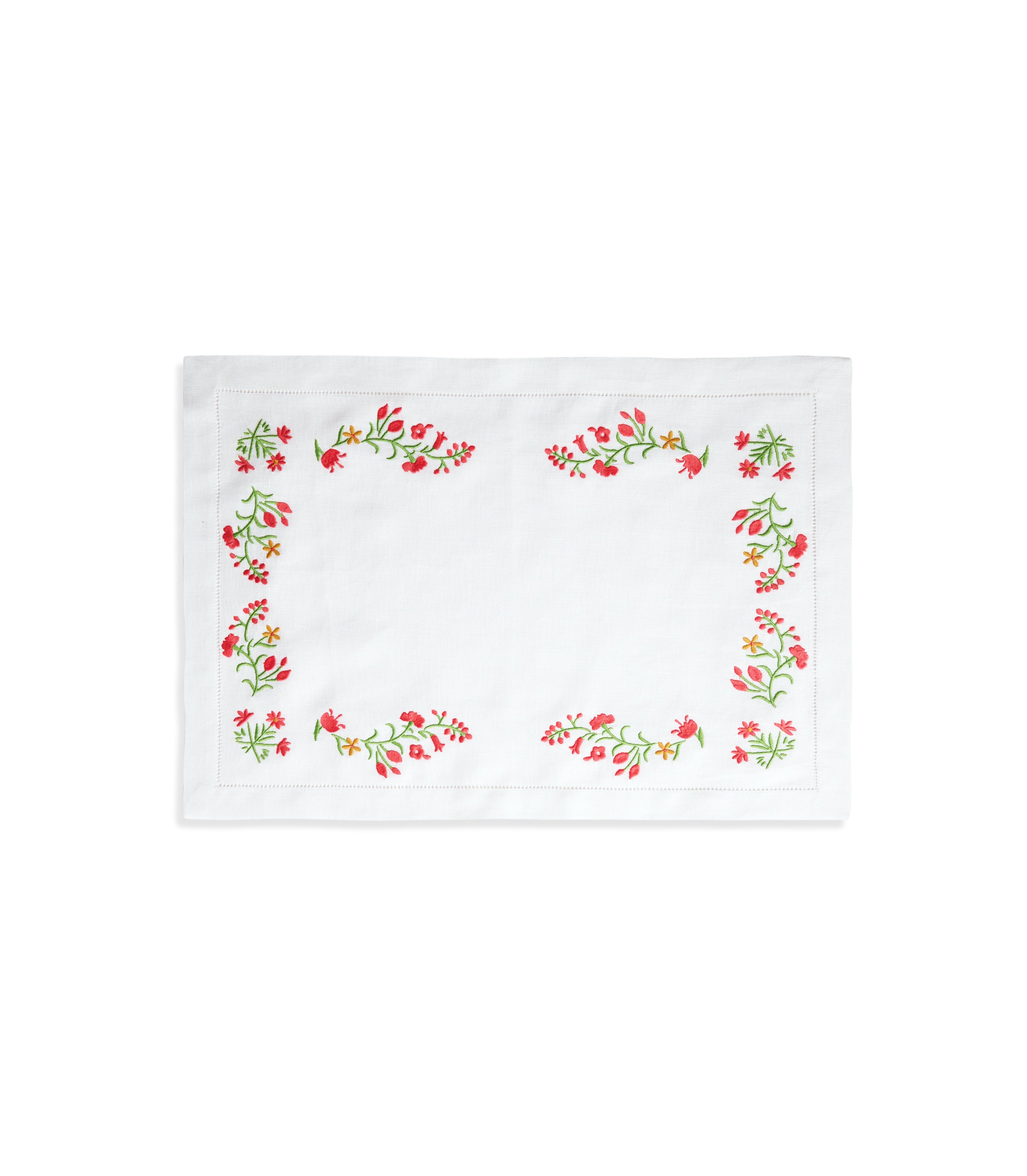 White linen placemat with floral embroidery